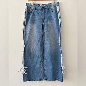Wide leg jeans with white side stripes and bows size 11 / 30” length